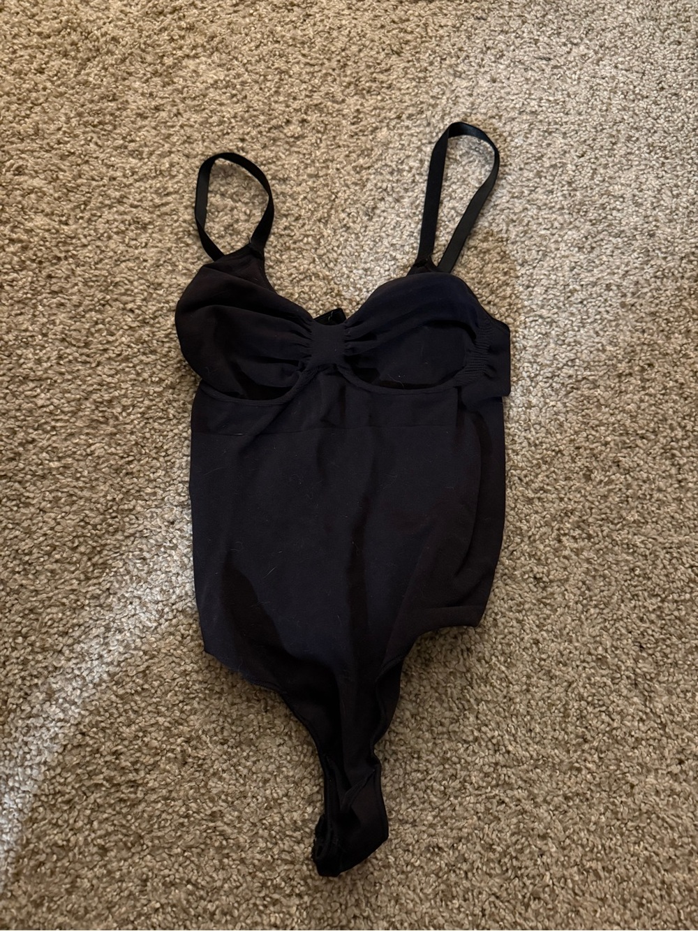 Black One-Piece skims bodysuit